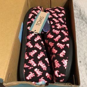 Glow in the dark neon pink T-Rex skeleton print